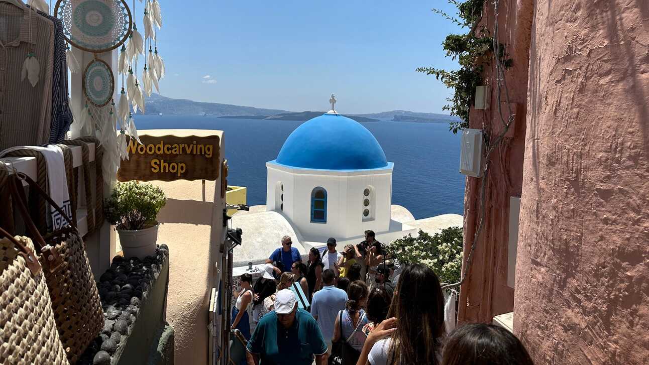 Santorini locals urged to stay home amid tourist surge